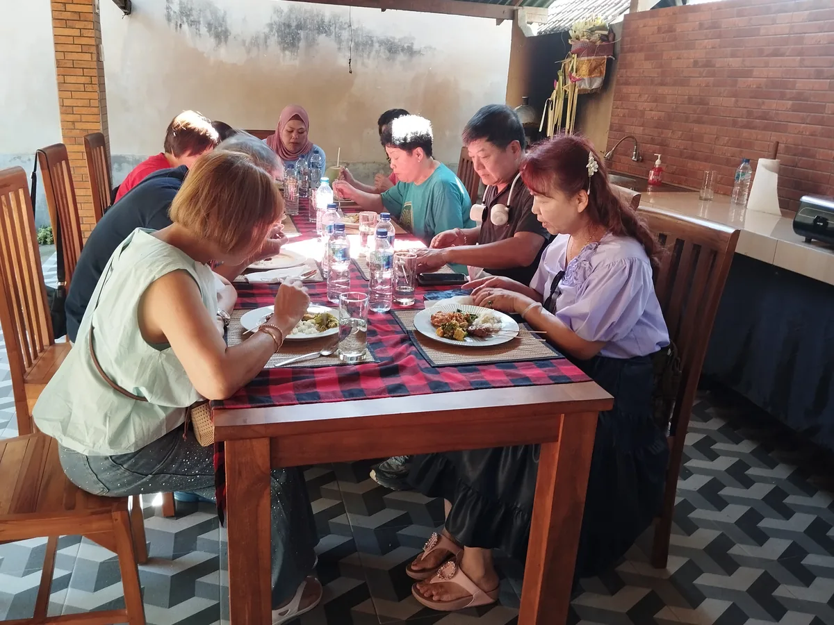 Guests sharing the meal they prepared after a Balinese cooking class